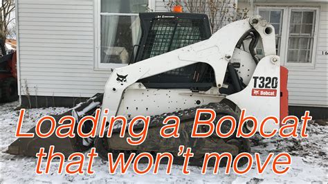 how to load a dead skid steer|moving a dead skid steer.